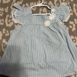 Blue dress shirt! With white flower. Size 4